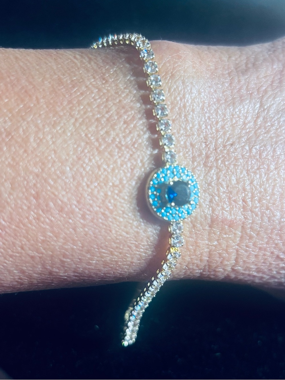 Gold Bracelet with Blue Center Disc and Pavé Crystals